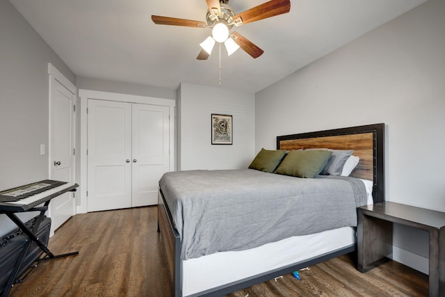 bedroom featuring ceiling fan, a closet, and dark hardwood / wood-style floors