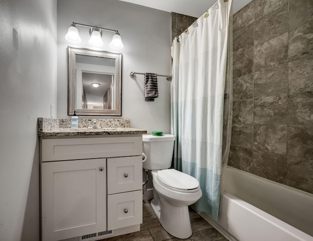 full bathroom featuring shower / bath combo, vanity, hardwood / wood-style flooring, and toilet