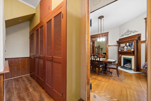 428 N Main St, Trenton, KY 42286 - hallway featuring wood walls, ornamental molding, and dark wood-type flooring