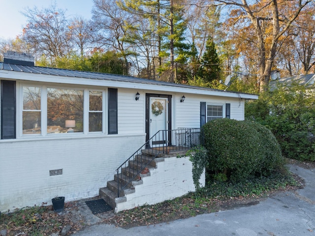 1206 Peter Pan Rd, Lookout Mountain, GA 30750 - view of front facade with metal roof and crawl space
