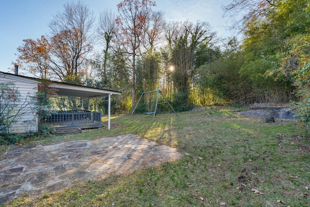 view of yard with a wooden deck