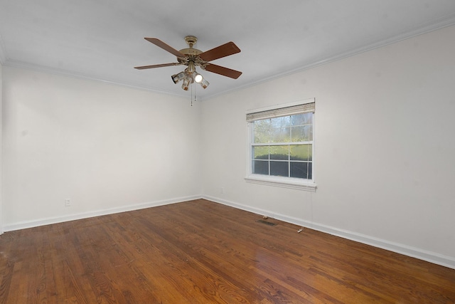 1206 Peter Pan Rd, Lookout Mountain, GA 30750 - unfurnished room with baseboards, a ceiling fan, ornamental molding, and dark wood-type flooring