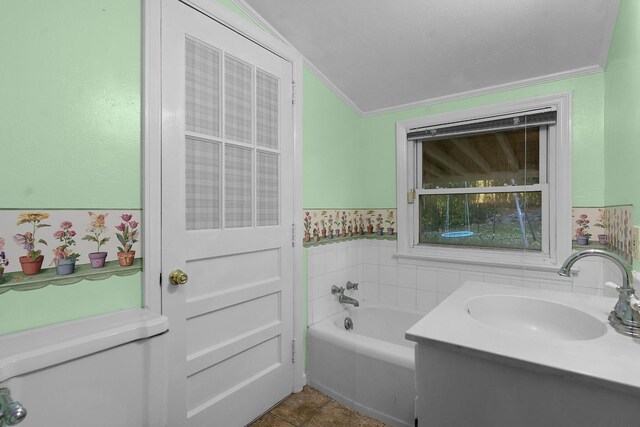 1206 Peter Pan Rd, Lookout Mountain, GA 30750 - full bath featuring a bath, ornamental molding, wainscoting, vanity, and tile walls