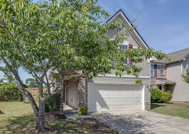 view of front facade featuring a front yard and a garage