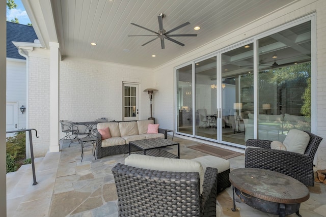 view of patio featuring ceiling fan