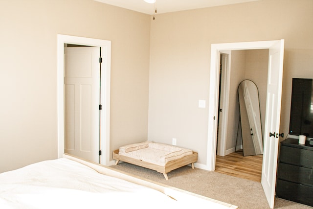 bedroom with light hardwood / wood-style floors