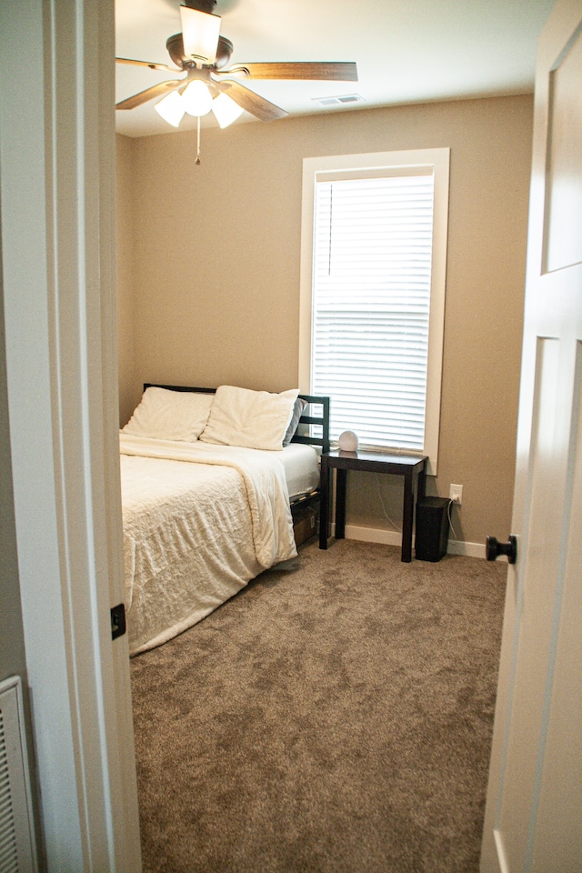 bedroom with carpet and ceiling fan