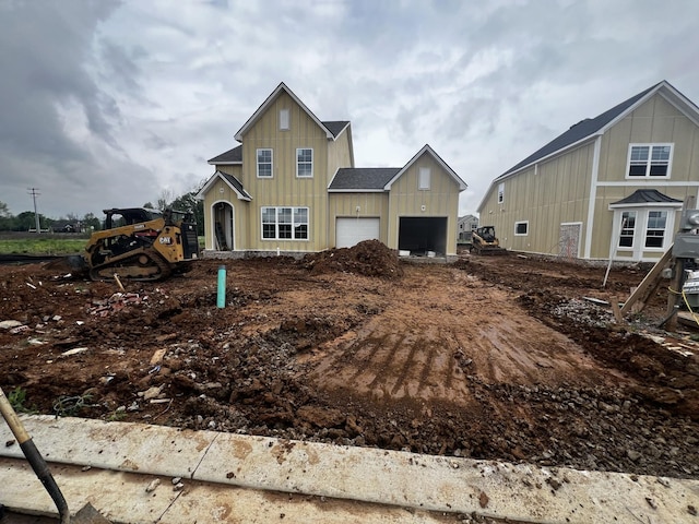 view of front of house featuring an attached garage and board and batten siding