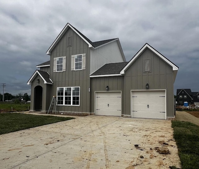 4024 Tawnya Charles Ln, Murfreesboro, TN 37128 - modern farmhouse style home featuring board and batten siding, concrete driveway, a garage, and roof with shingles
