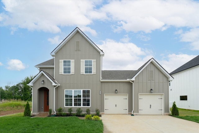 4024 Tawnya Charles Ln, Murfreesboro, TN 37128 - view of front of home with board and batten siding, driveway, and a front lawn