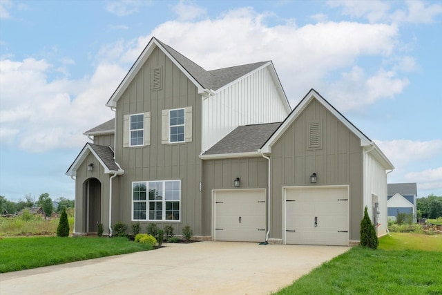 4024 Tawnya Charles Ln, Murfreesboro, TN 37128 - view of front of home featuring board and batten siding, concrete driveway, a front yard, a shingled roof, and an attached garage