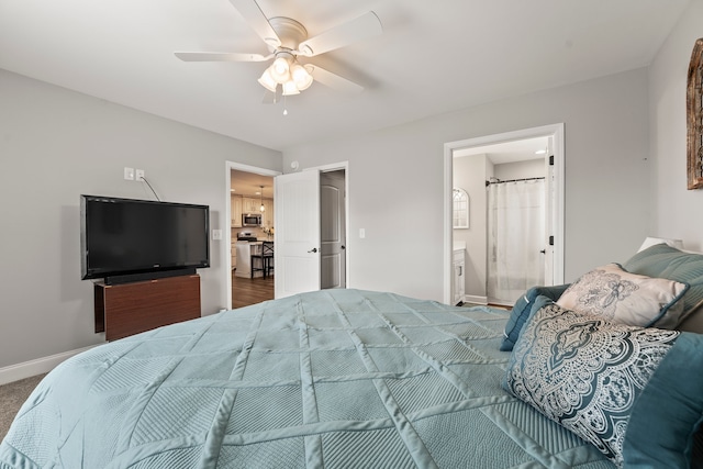 bedroom featuring ceiling fan and connected bathroom