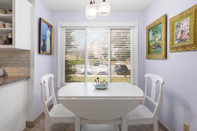 dining room featuring a chandelier