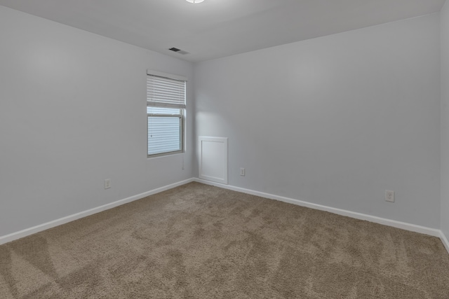 empty room with carpet floors