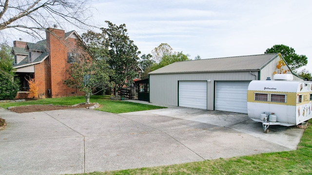 garage with a lawn