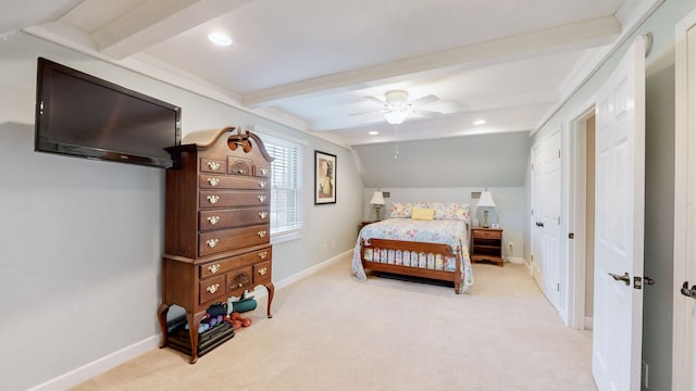 bedroom with lofted ceiling with beams, ceiling fan, and light colored carpet