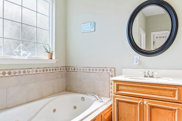 bathroom featuring a bathtub and vanity