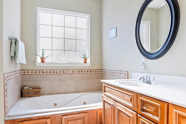 bathroom with a bath and vanity