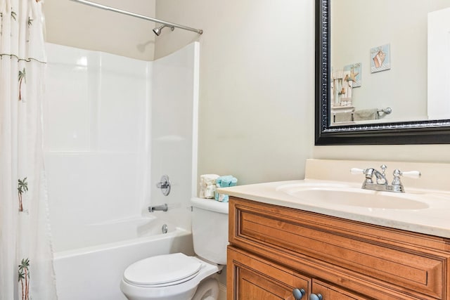 full bathroom with vanity, toilet, and shower / bath combo with shower curtain