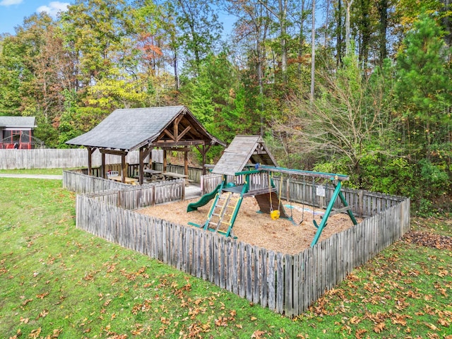 view of jungle gym with a gazebo and a lawn