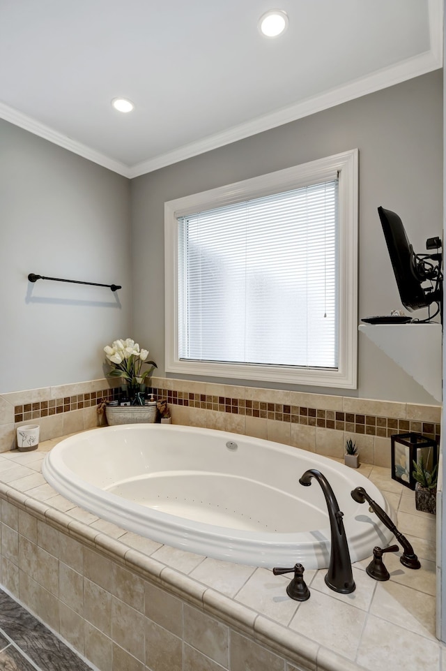 bathroom with tiled bath and crown molding