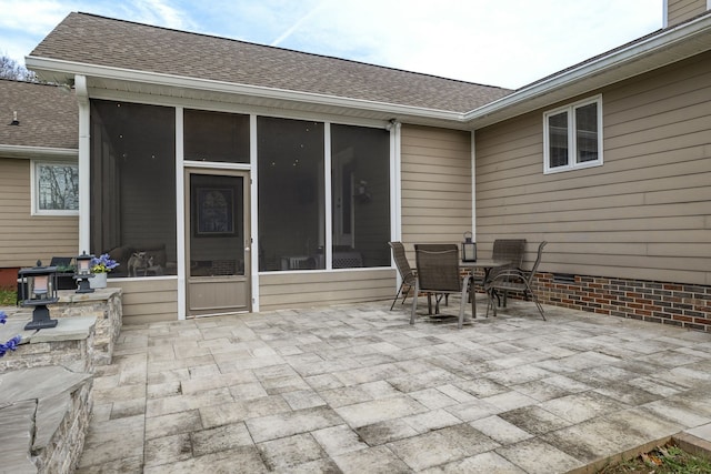 view of patio / terrace with a sunroom