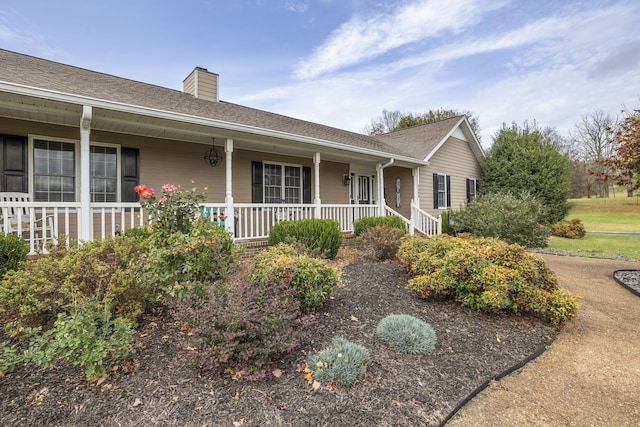 ranch-style home with covered porch