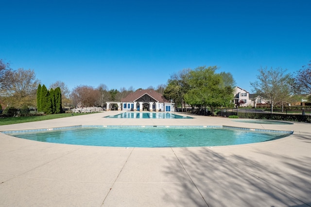 view of pool featuring a patio