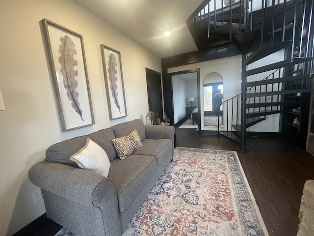 living room featuring dark hardwood / wood-style floors