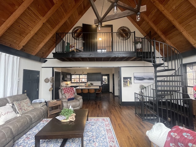 living room with hardwood / wood-style flooring, beam ceiling, wooden ceiling, and high vaulted ceiling