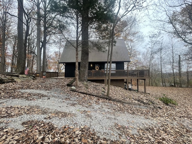 2029 Holly Creek Rd, Celina, TN 38551 - view of front facade featuring metal roof and a deck
