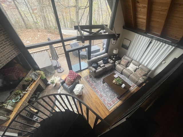 living room featuring wooden ceiling and wood-type flooring