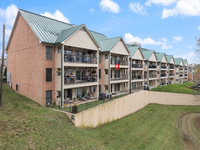 view of property with central air condition unit