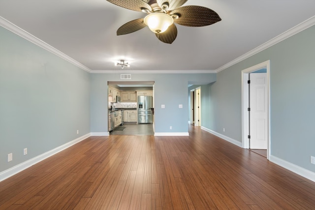 unfurnished living room featuring crown molding, ceiling fan, and hardwood / wood-style floors