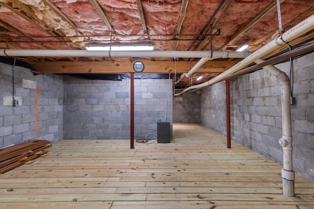 basement with light wood-type flooring