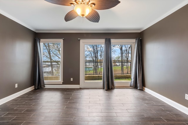 unfurnished room with crown molding and ceiling fan