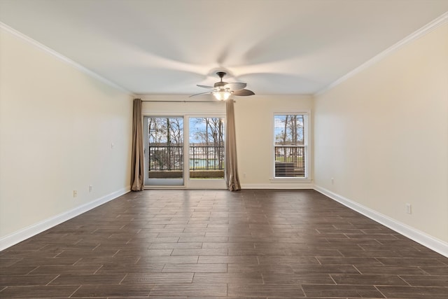 empty room featuring crown molding and ceiling fan