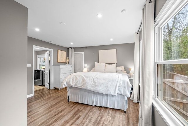 bedroom with light hardwood / wood-style floors