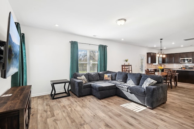 living room featuring light hardwood / wood-style floors