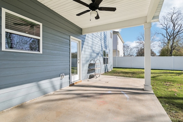 view of patio featuring ceiling fan