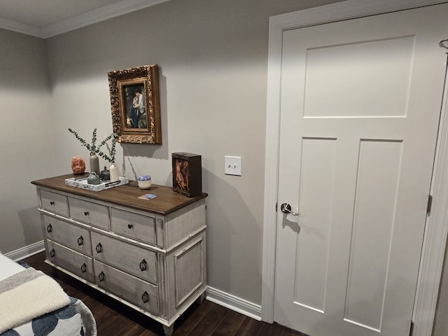 interior space with wood-type flooring and crown molding