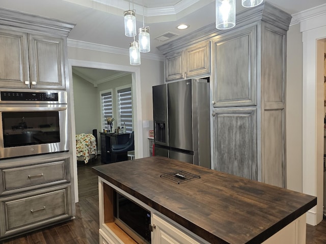 140 Dunn Fall River Rd, Leoma, TN 38468 - kitchen featuring appliances with stainless steel finishes, wooden counters, ornamental molding, dark wood-style flooring, and recessed lighting