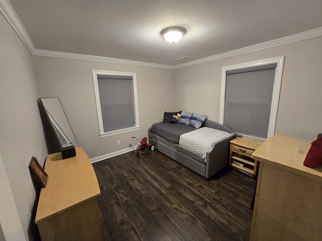 bedroom with dark hardwood / wood-style flooring and crown molding