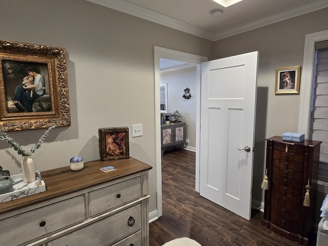 corridor with ornamental molding and dark wood-type flooring