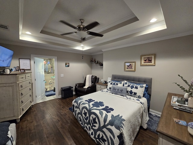 bedroom with a raised ceiling, ceiling fan, and ornamental molding