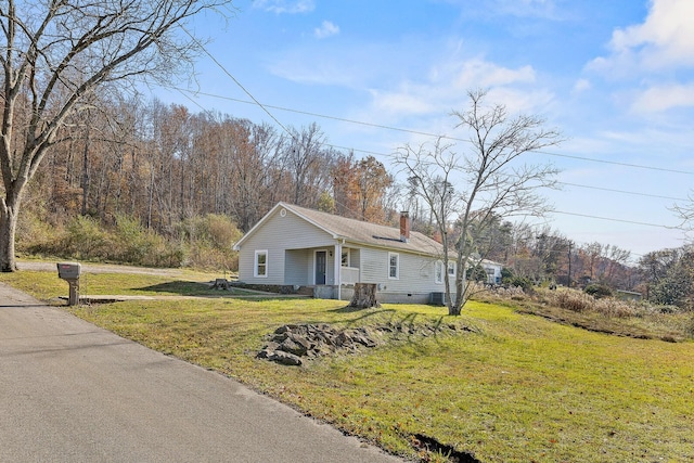 view of front of home with a front yard