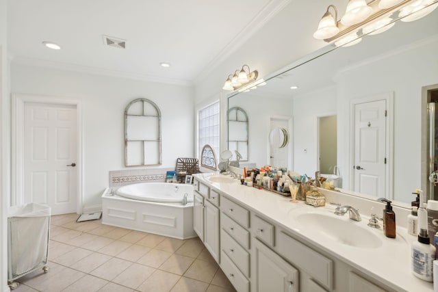 bathroom with a tub, vanity, ornamental molding, and tile patterned flooring