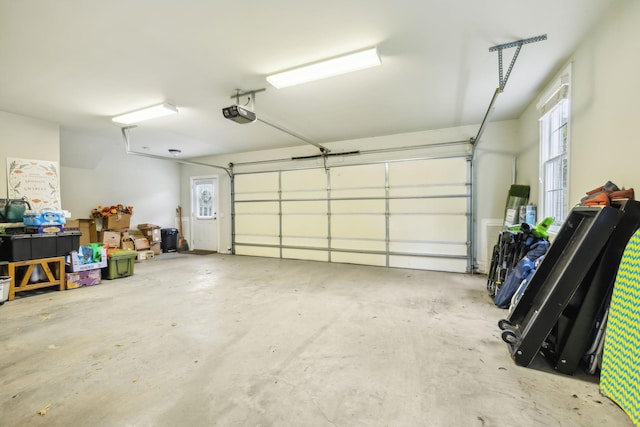 garage featuring a garage door opener