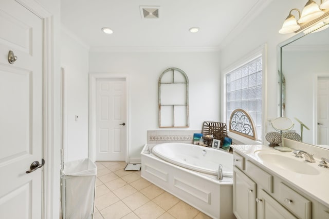 bathroom featuring tile patterned flooring, ornamental molding, a tub to relax in, and vanity