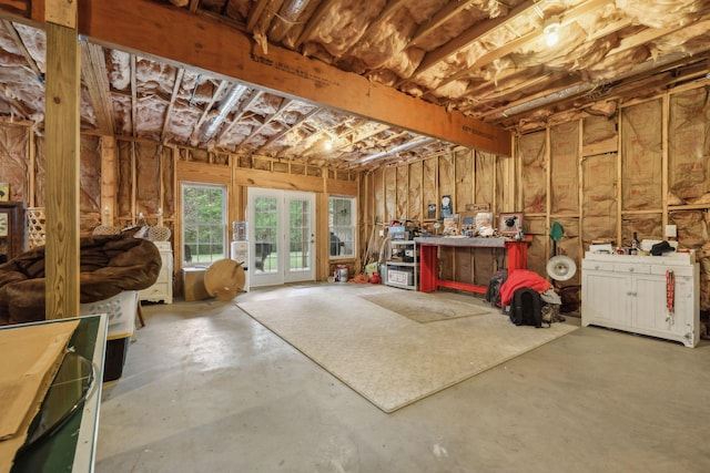 misc room with concrete floors and a workshop area